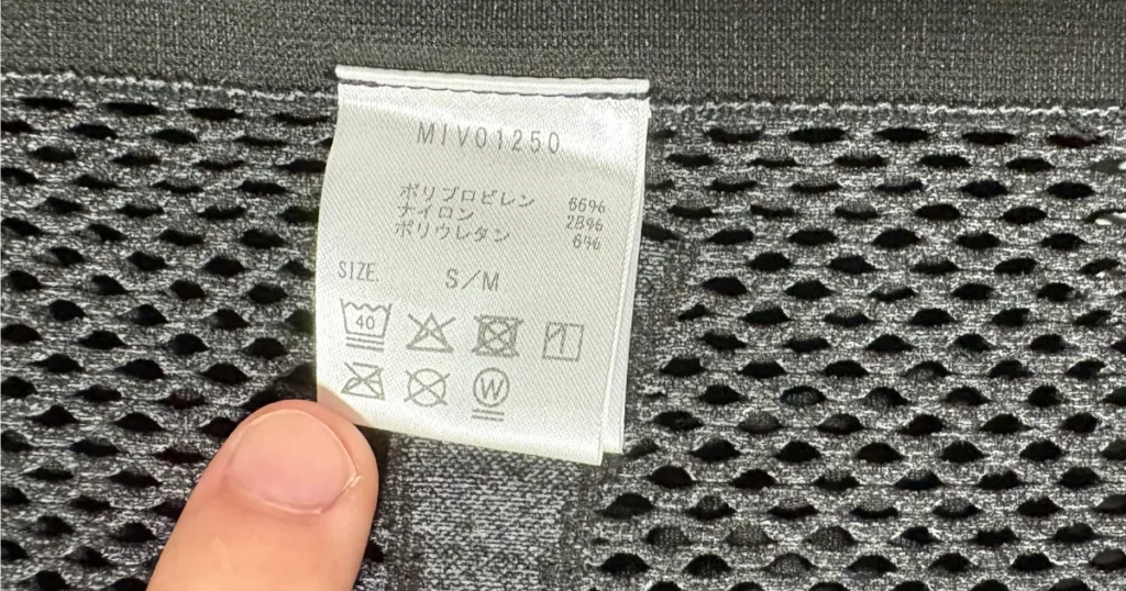 ミレー MIV01250の品質表示タグ ポリプロピレン66%とサイズS/M